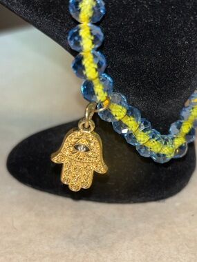 Blue & yellow glass beaded stretch bracelet w/ gold toned Hamsa hand charm, NWOT